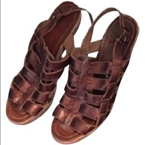 Christian Louboutin
Bronze Barcelona Pumps